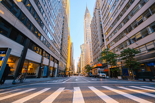 New York street, seen from street level at sunrise